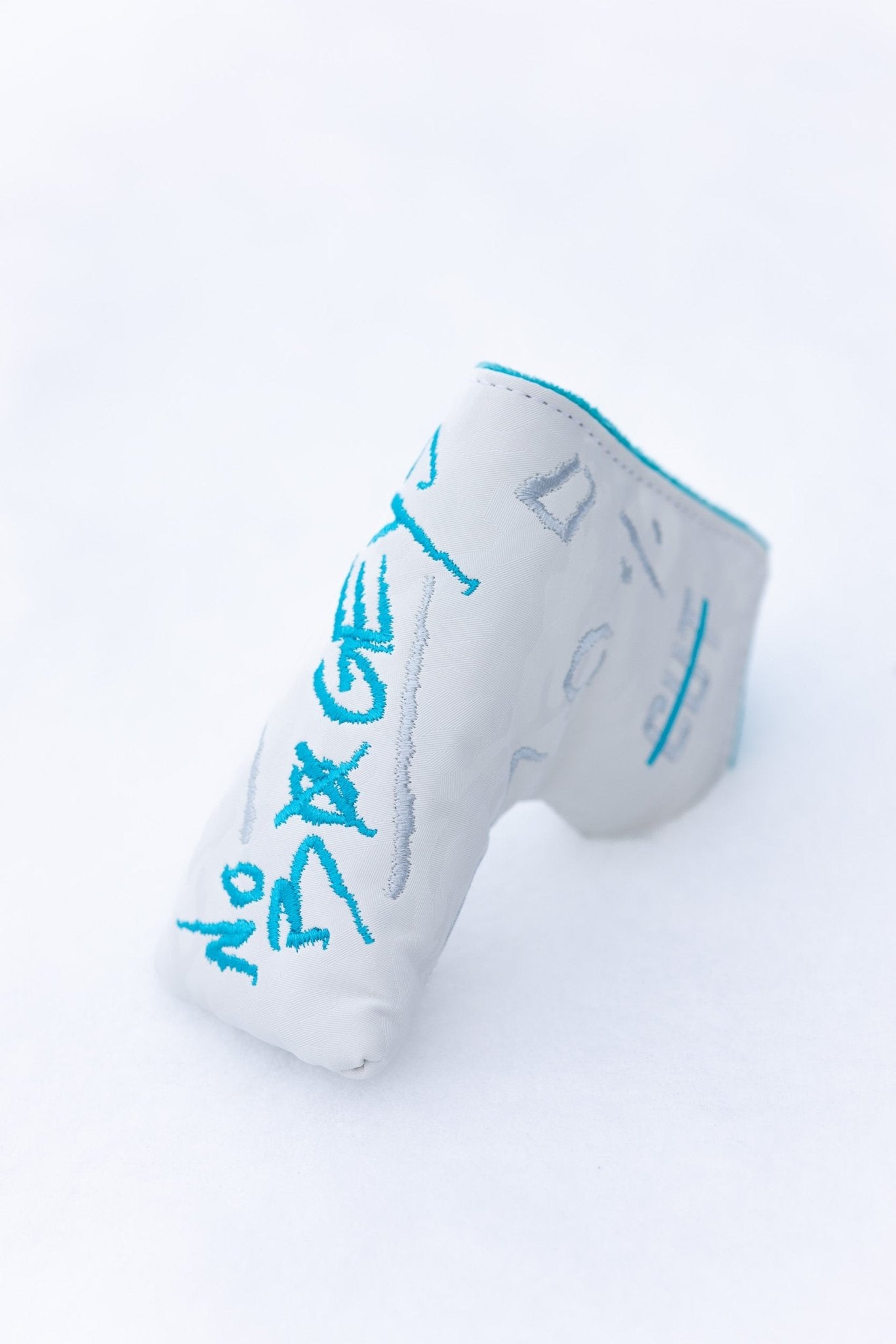 No Bogeys White Blade Cover with blue and gray embroidery for golf club protection and style.