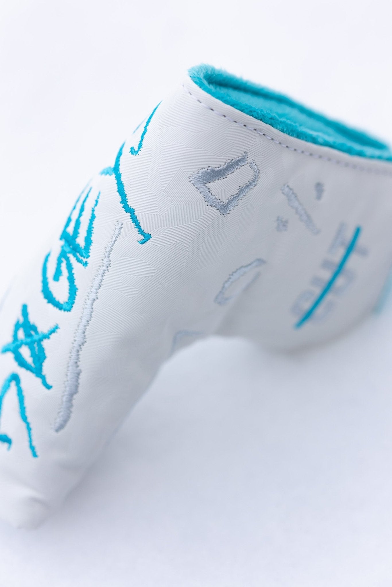 No Bogeys White Blade Cover golf headcover with blue embroidery and soft turquoise interior lining