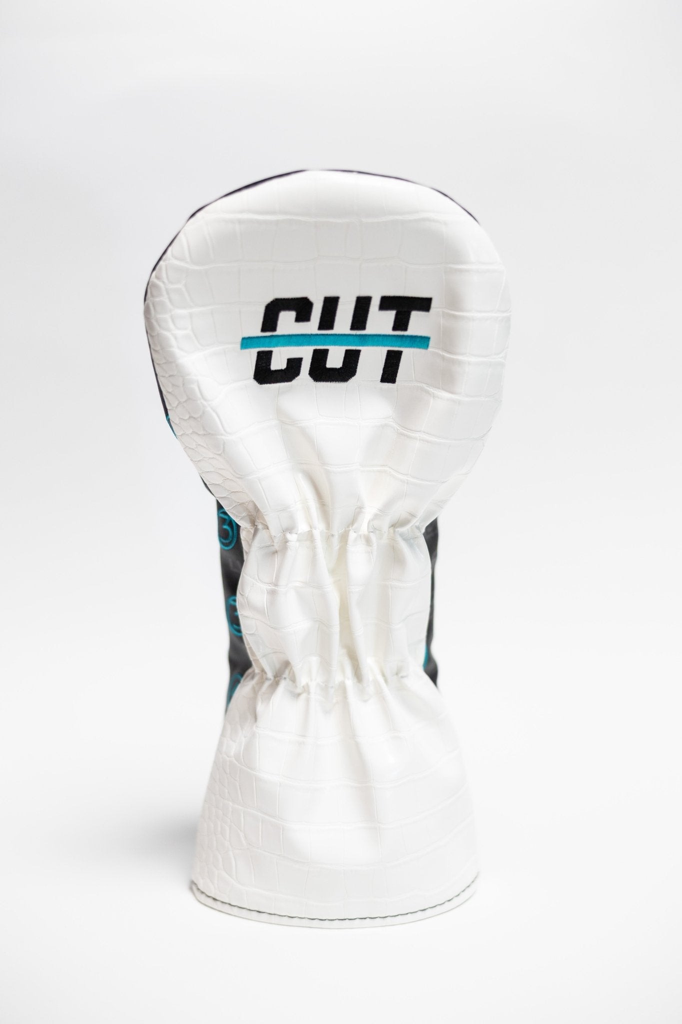 White textured golf driver cover with "CUT" logo and teal accent, Teal Gator Scorecard Driver Cover