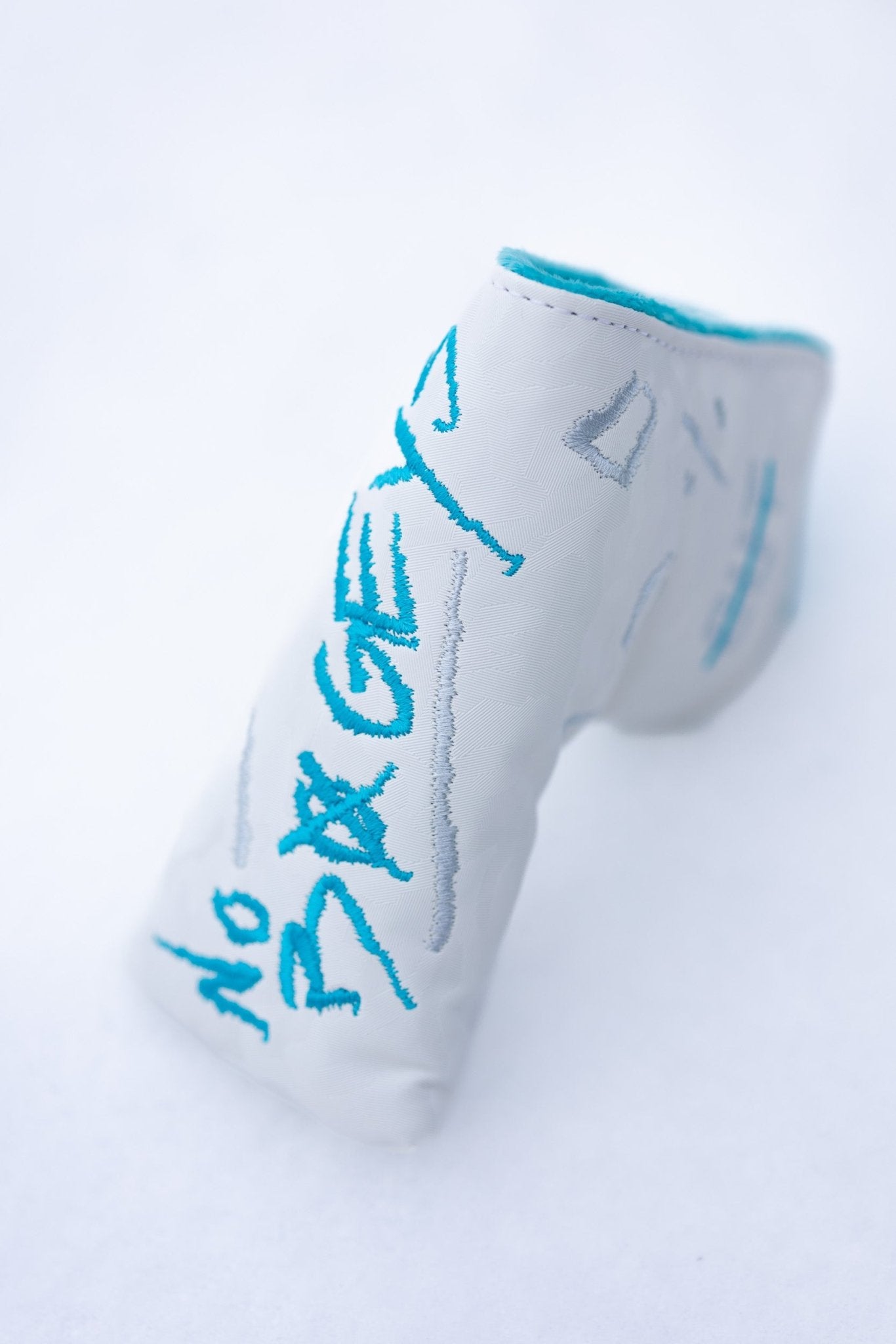 No Bogeys White Blade Cover with blue embroidered text and soft lining designed for golf headcovers and gear protection
