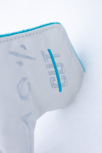 No Bogeys White Blade Cover with embroidered blue and white logo and soft turquoise lining golf headcover close-up.