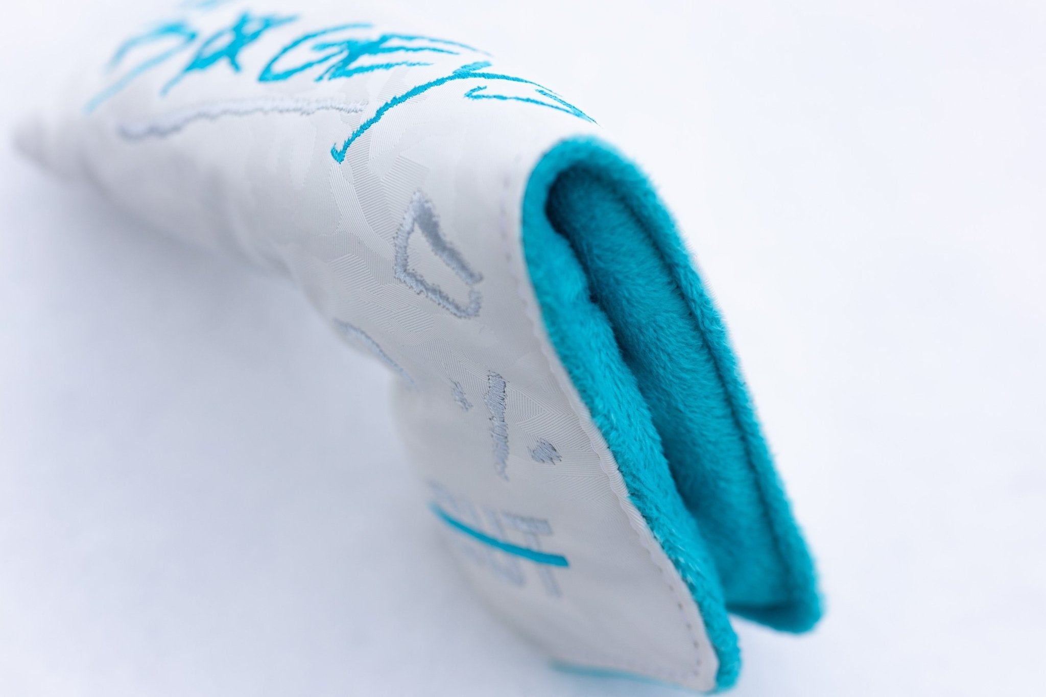 No Bogeys White Blade Cover with blue interior lining designed for golf gear protection and style