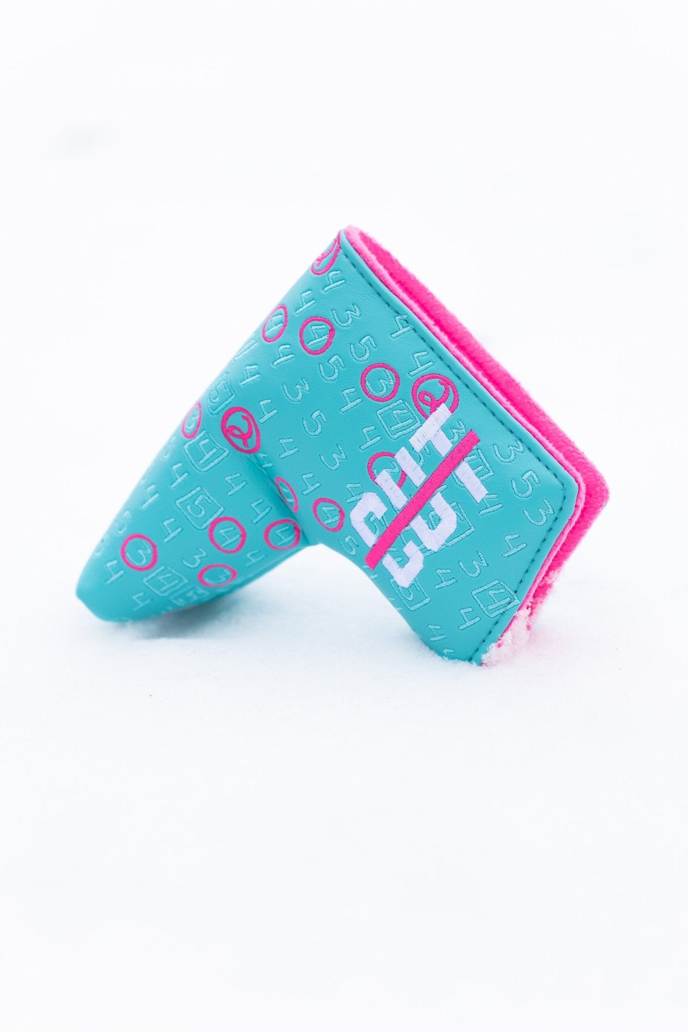 Scorecard Teal Blade golf club headcover with teal exterior and bright pink lining against white background