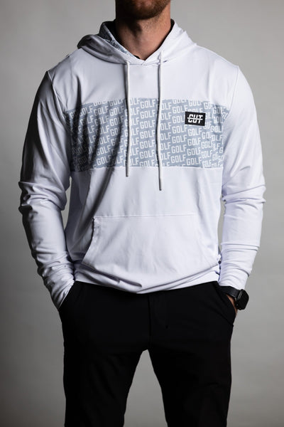 Man wearing GOLF Whiteout Athletic Hoodie with gray patterned chest panel and front pocket, styled with black pants
